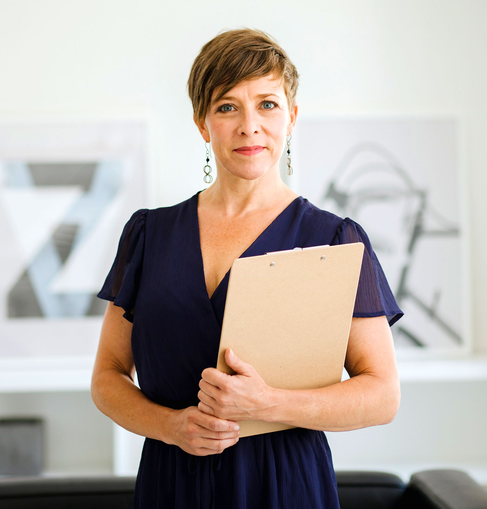 Woman Holding a Clipboard Woman Holding a Clipboard